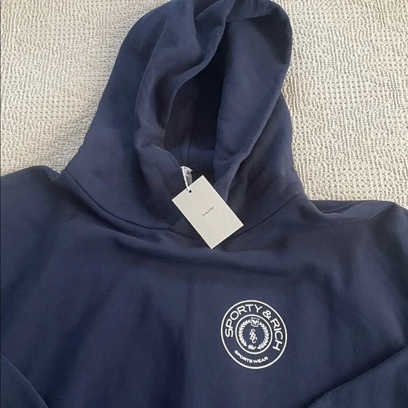 Sporty & Rich Dark Blue Hoodie XL NWT
All Cotton. - Picture 2 of 7